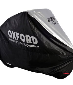 A photo of the Oxford Aquatic Bike Cover, a large black and silver cover that fits over a standard adult bike